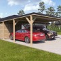 Holzbrüder Doppelcarport Ralf mit Geräteraum, naturbelassen, mit zwei parkenden Autos.