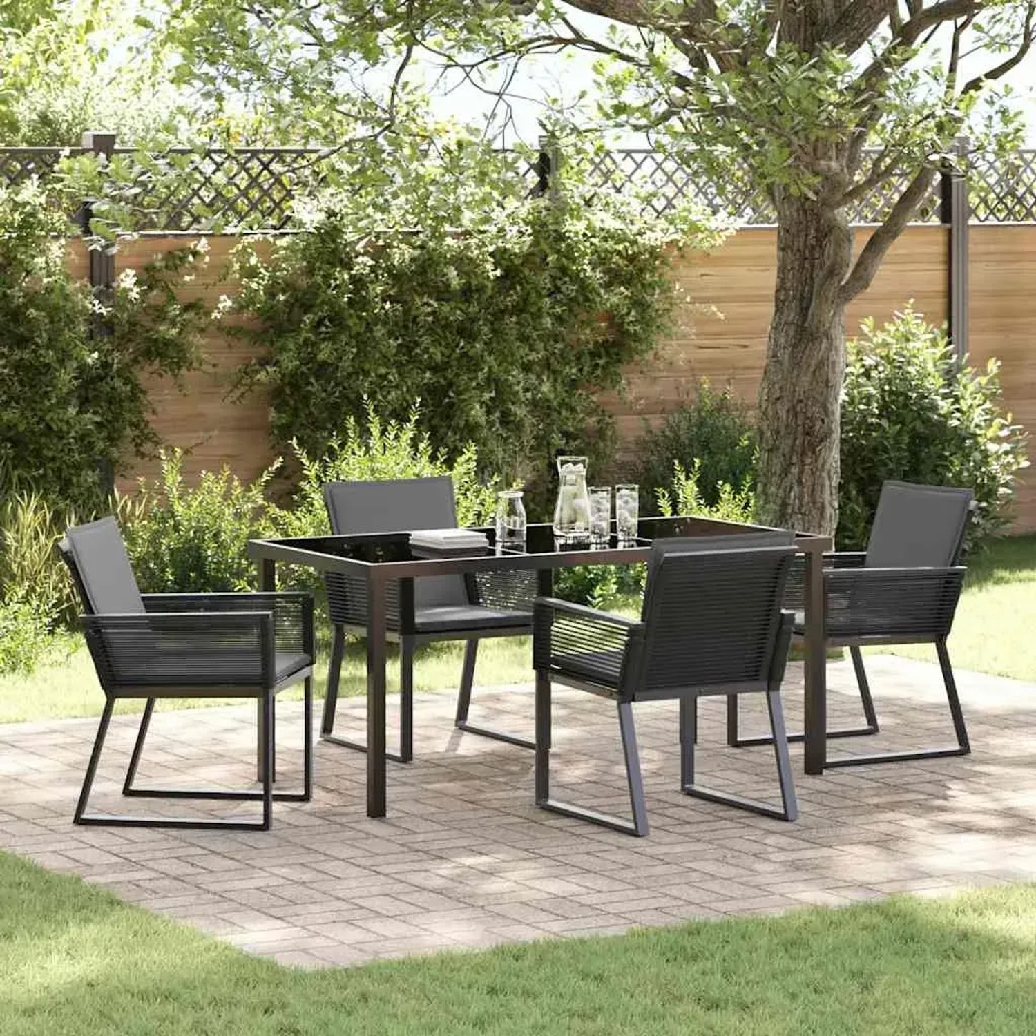 Schwarze 5-tlg. Garten Essgruppe aus Poly Rattan mit Tisch und 4 Stühlen.
