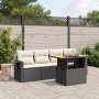 Schwarze 5-tlg. vidaXL Garten-Sofagarnitur aus Poly Rattan mit cremefarbenen Kissen und Tisch.