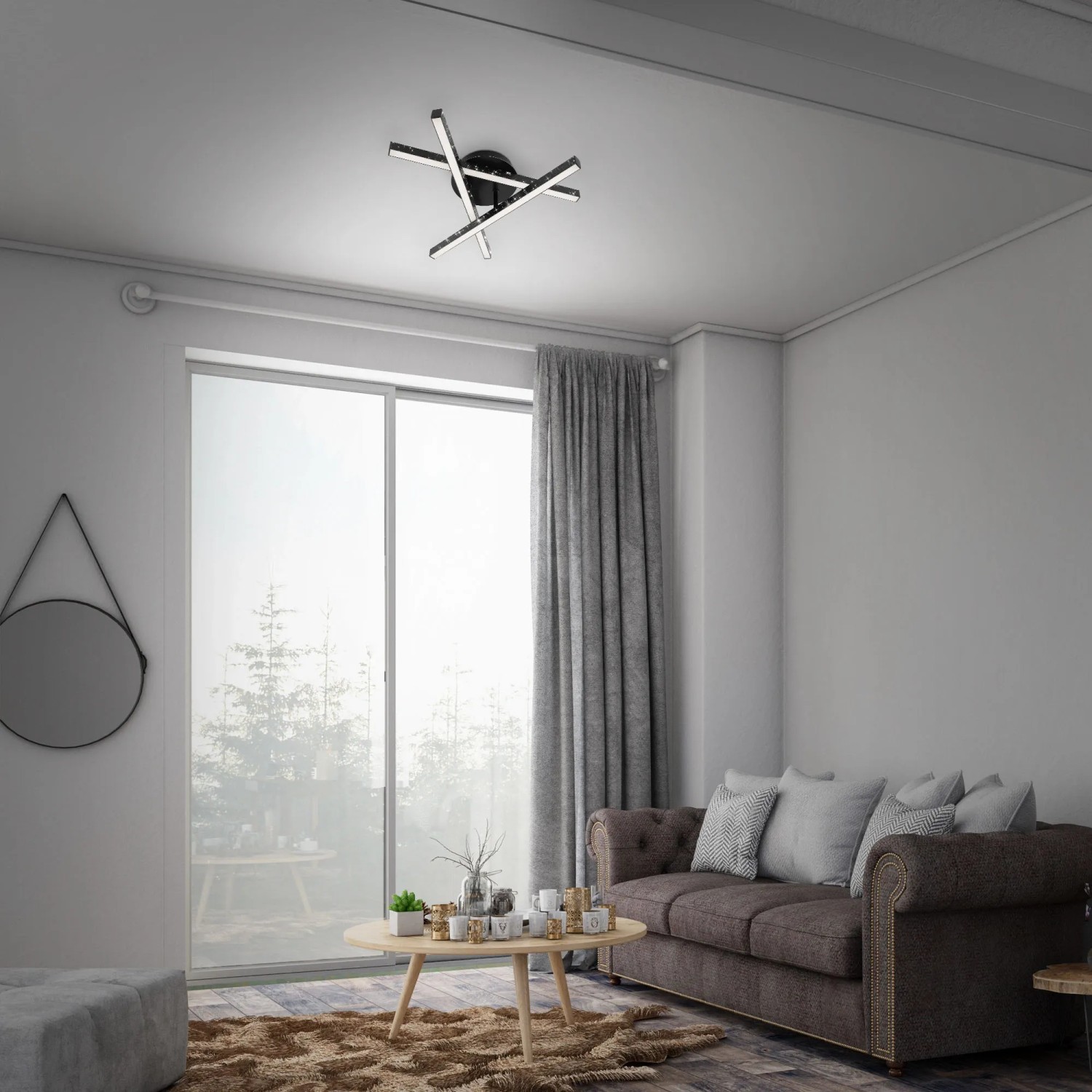 Moderne Brilo LED-Deckenleuchte Rey, 3-flammig, schwarz, im Wohnzimmer. Glitzer-Effekt durch Laserlochoptik.