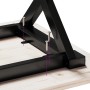 Detailansicht: Montage des vidaXL Couchtischs mit X-Gestell aus Kiefernholz und Gusseisen.