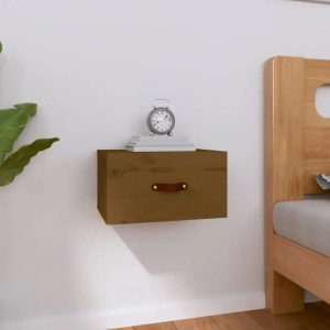 Honigbrauner Wand-Nachttisch aus Kiefernholz mit Ledergriff, montiert an einer weißen Wand.