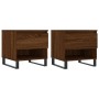 Zwei braune Couchtische in Eichen-Optik mit Schublade und Ablage, Metallbeine.