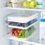 Rotho Kühlschrankorganizer Cauma 2,6 l, weiß, gefüllt mit Lebensmitteln im Kühlschrank.