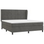 Dunkelgraues Boxspringbett 160x200 cm mit Samtbezug, inklusive Matratze und Kopfteil.