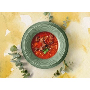 Seltmann Weiden Beat Coor Glaze Suppenteller in Salbeigrün mit angerichteter Suppe.