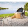 Finntherm Hot Tub Stockholm Spa Edition: Holzpool mit Thermoholz-Verkleidung und GFK-Einsatz im Garten.