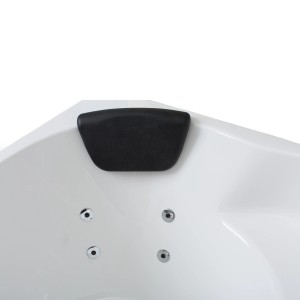 Detailaufnahme: Weißer Basera® Eck-Whirlpool Formentera mit schwarzer Kopfstütze und Düsen.