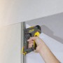 Stanley FatMax TR75 Handtacker in Verwendung, geeignet für Klammern, Nägel und Stifte.