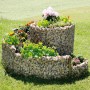 Bellissa Gabionen-Kräuterspirale Groß mit Bepflanzung im Garten.