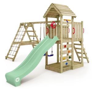 Wickey Spielturm RocketFlyer mit Rutsche, Schaukel und Kletterwand in Pastellgrün.