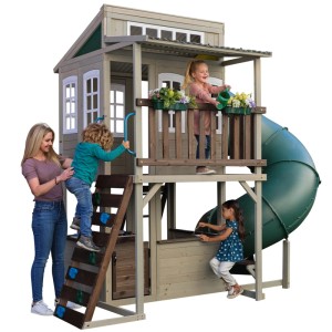 KidKraft Cozy Escape Spielhaus mit Rutsche, Kletterwand und Kinderküche im Garten.