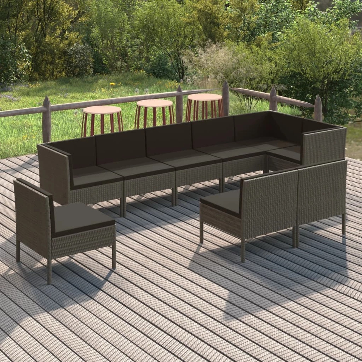 Graues 9-tlg. vidaXL Garten-Lounge-Set aus Rattan mit anthrazitfarbenen Auflagen im Garten.
