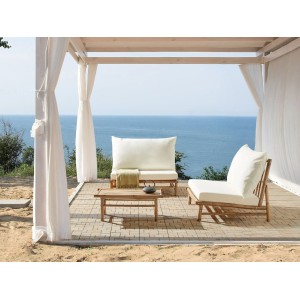 Beliani Lounge Set TODI Cremeweiß aus Bambus mit Tisch und Polstern im Garten.