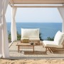 Beliani Lounge Set TODI Cremeweiß aus Bambus mit Tisch und Polstern im Garten.