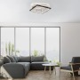 Moderne, weiße LED-Deckenleuchte Mailak (57x57 cm) von Paul Neuhaus im Wohnzimmer.
