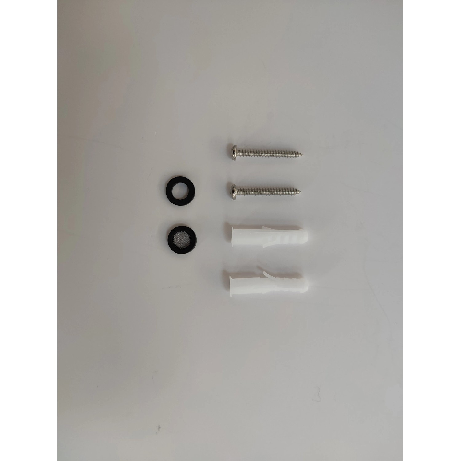 Montagematerial für Thermoflow Durchlauferhitzer: 2 Schrauben, 2 Dübel, 2 Dichtungen.