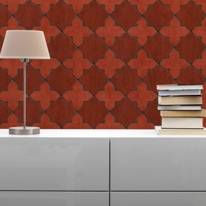 Rote Vliestapete mit grafischem, sternförmigem Muster. Dekorative Wandgestaltung für moderne Räume.