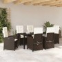 Braune 7-teilige vidaXL Garten Essgruppe aus Polyrattan mit Tisch und Stühlen mit Auflagen.