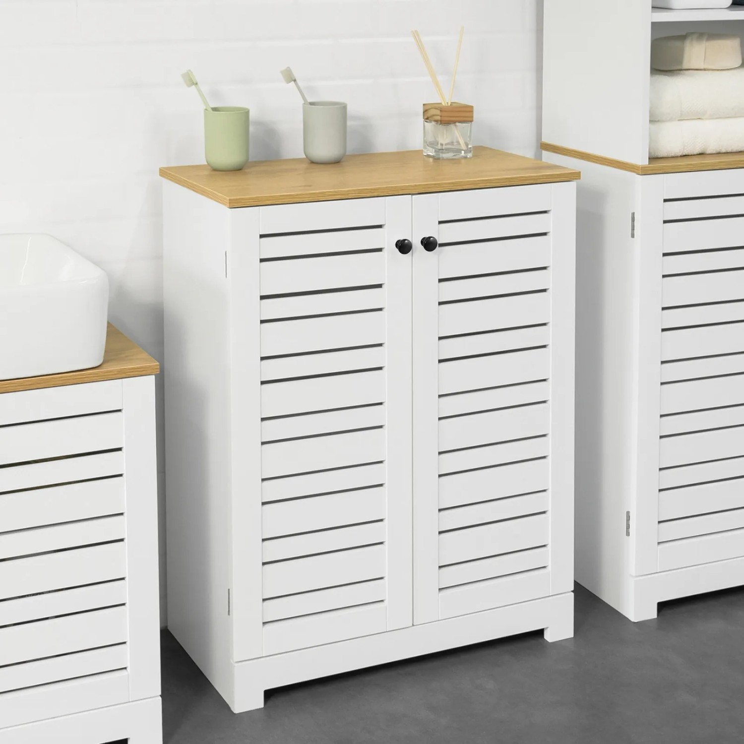 SoBuy Badschrank BZR41-W: Weißer Badezimmerschrank mit Lamellentüren und Holzplatte.