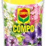 Compo Balkon- und Kübelpflanzendünger 1,3l Flasche mit Dosierhilfe und Blüten-Motiv.