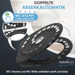 Schwarzer SANILO WC-Sitz mit Yin Yang Muster, Absenkautomatik und Schnellverschluss. Robuster Toilettensitz.