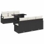 Schwarzes 7-teiliges vidaXL Garten-Sofa-Set aus Polyrattan mit Tisch und cremefarbenen Kissen.