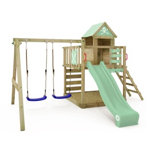 Wickey Spielturm Smart Cave mit Rutsche in Pastellgrün, mit Schaukel und Kletterwand.