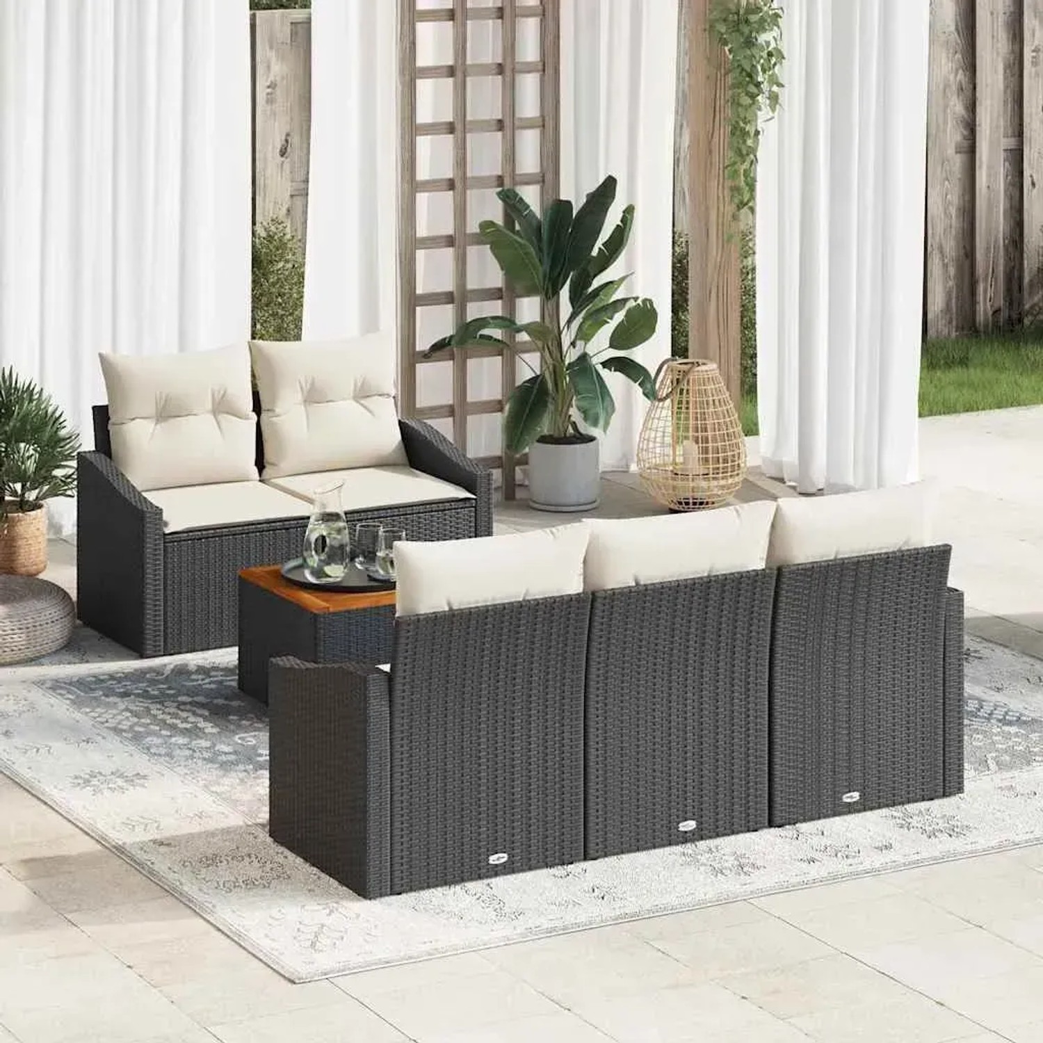 Schwarzes 6-tlg. vidaXL Garten-Sofa-Set aus Poly Rattan mit Kissen und Tisch.