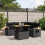Schwarze 6-teilige Garten-Sofagarnitur aus Polyrattan mit Tisch und Kissen.