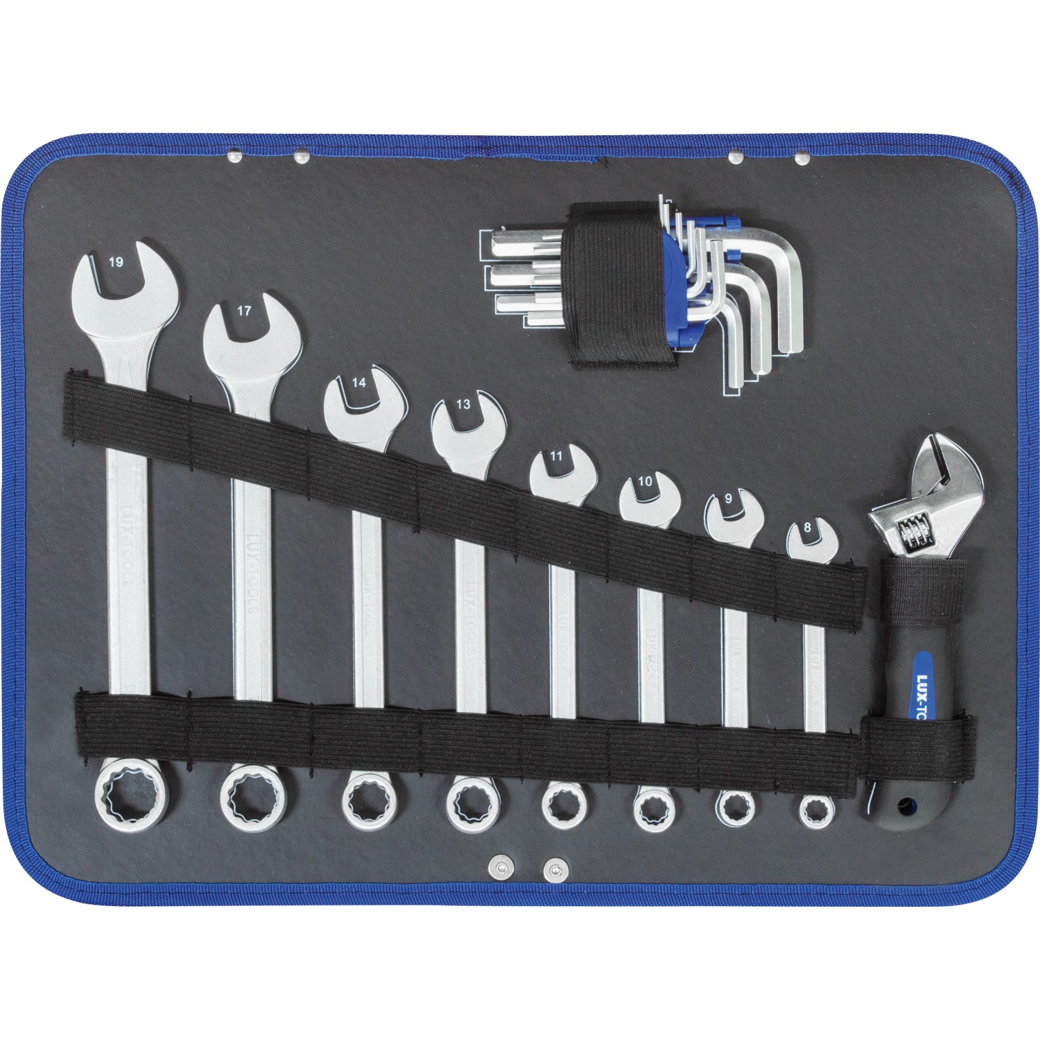 Offener LUX Werkzeugkoffer mit Schraubenschlüsseln, Inbusschlüsseln und weiterem Werkzeug.