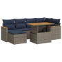 Graue 7-teilige vidaXL Garten-Sofagarnitur aus Polyrattan mit marineblauen Kissen und Tisch.