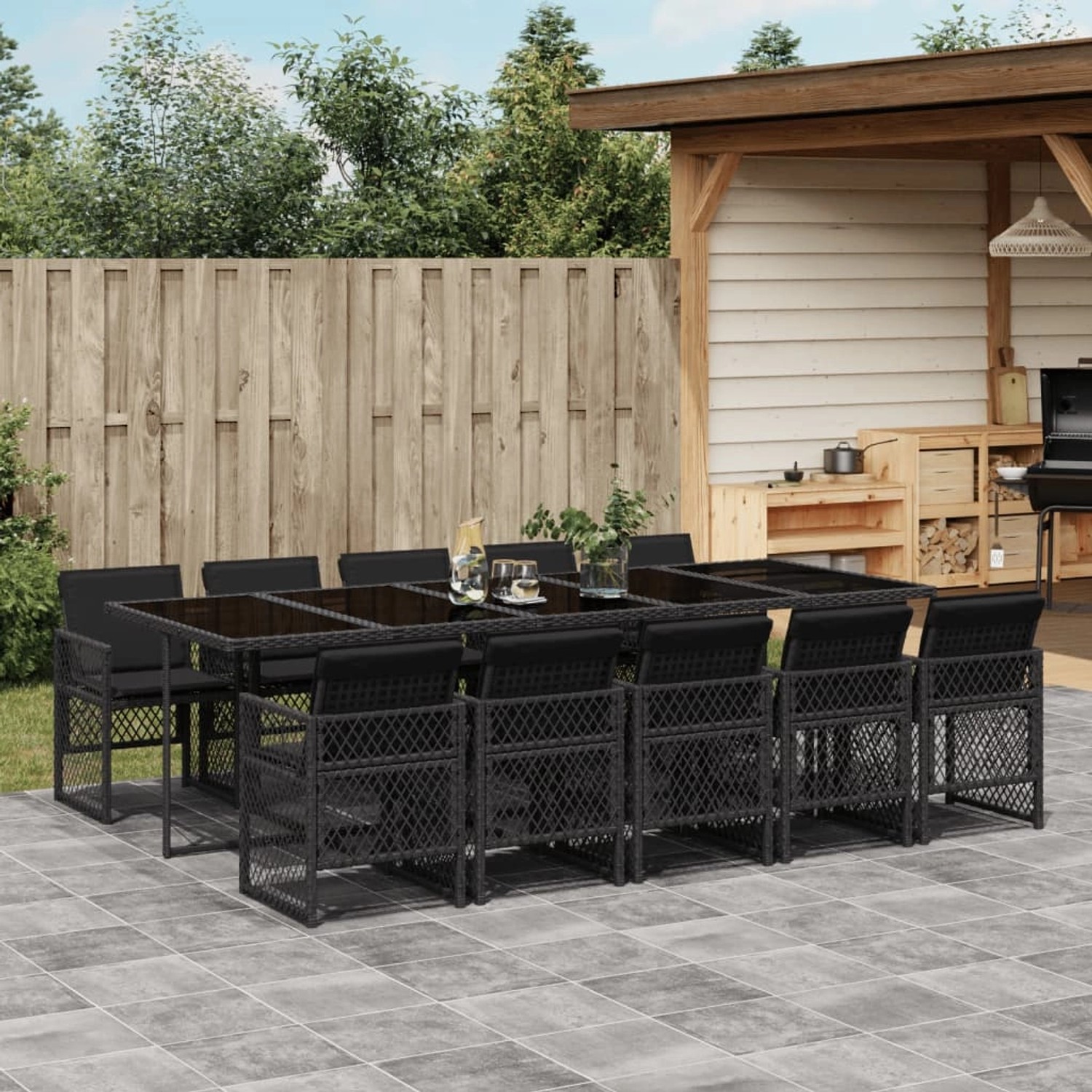Schwarze 11-tlg. Garten-Essgruppe aus Rattan mit Kissen. Ideal für Mahlzeiten im Freien.