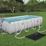 Bestway Solar Poolheizung (110x171cm) mit Pool im Garten. Solarabsorber zur Poolwasser Erwärmung.