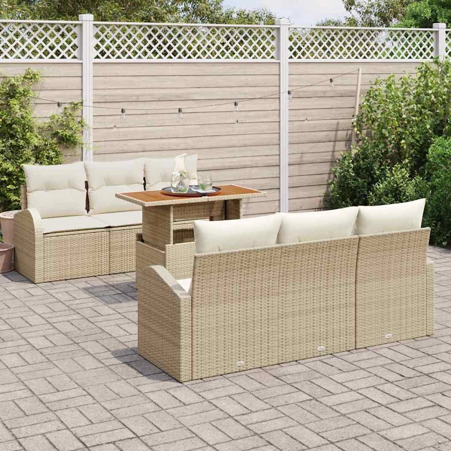 Beiges 7-teiliges vidaXL Garten-Sofa-Set aus Poly Rattan mit Tisch und Stauraum.
