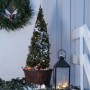 Konstsmide Micro LED Lichterkette mit warm-weißen Dioden und Außentrafo auf einer verschneiten Veranda.