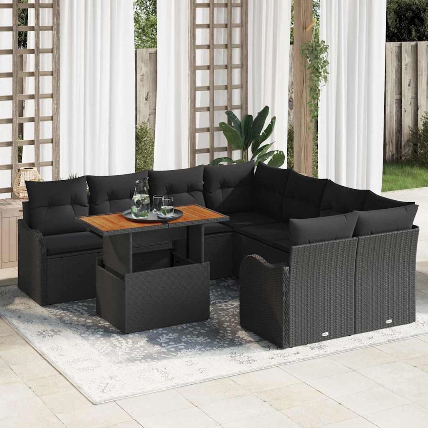 Schwarzes 9-teiliges vidaXL Garten-Sofa-Set aus Poly Rattan mit Tisch und Stauraum.