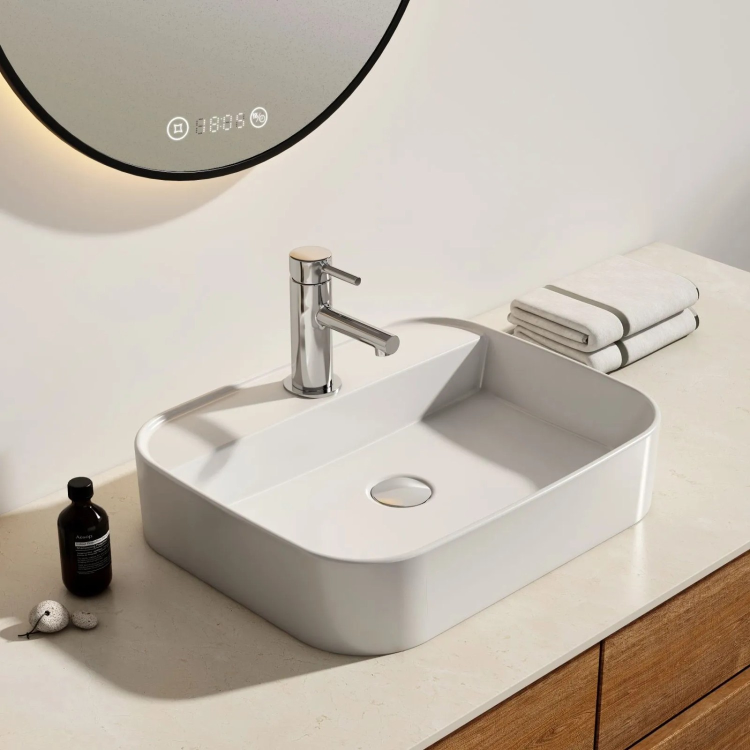 Modernes Emke Handwaschbecken, eckig, weiß, mit Hahnloch, als Aufsatzwaschbecken im Bad.