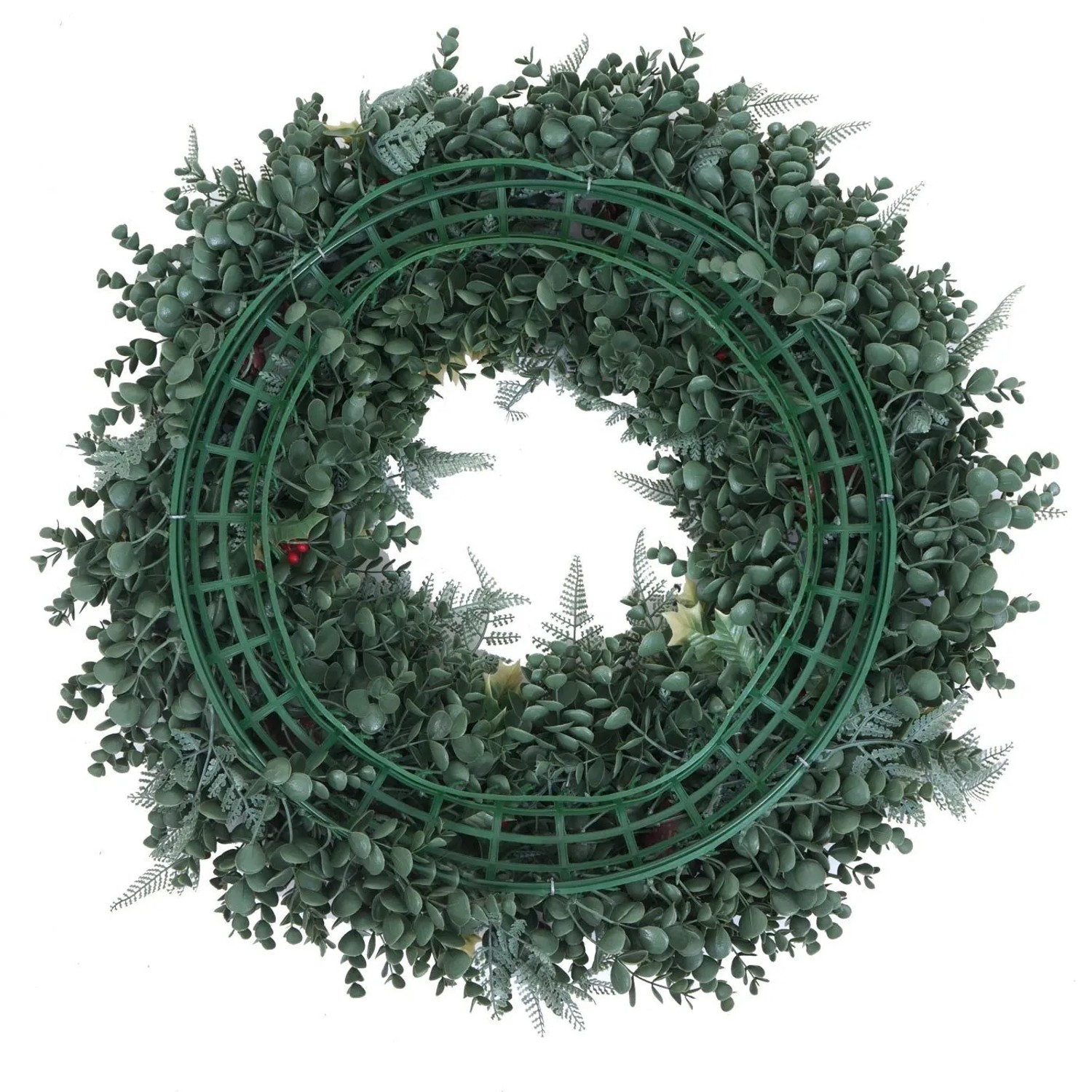 Rückseite des künstlichen Kranzes Ø 60cm mit grünem Kunststoffrahmen, Blättern und roten Beeren.