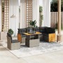 7-teilige graue Garten-Sofagarnitur aus Polyrattan mit Tisch und Kissen für Terrasse und Garten.