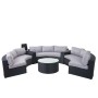 Anthrazitfarbene Poly-Rattan Lounge-Garnitur Savoie mit grauen Kissen und rundem Tisch für 9 Personen.