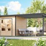 Karibu Gartenhaus Domingo 3 A mit Verlängerung in Natur-Anthrazit im Garten.