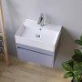 Rechteckiges, weißes Aquabatos Aufsatzbecken aus Keramik mit Unterschrank in Grau. Ideal für kleine Bäder.