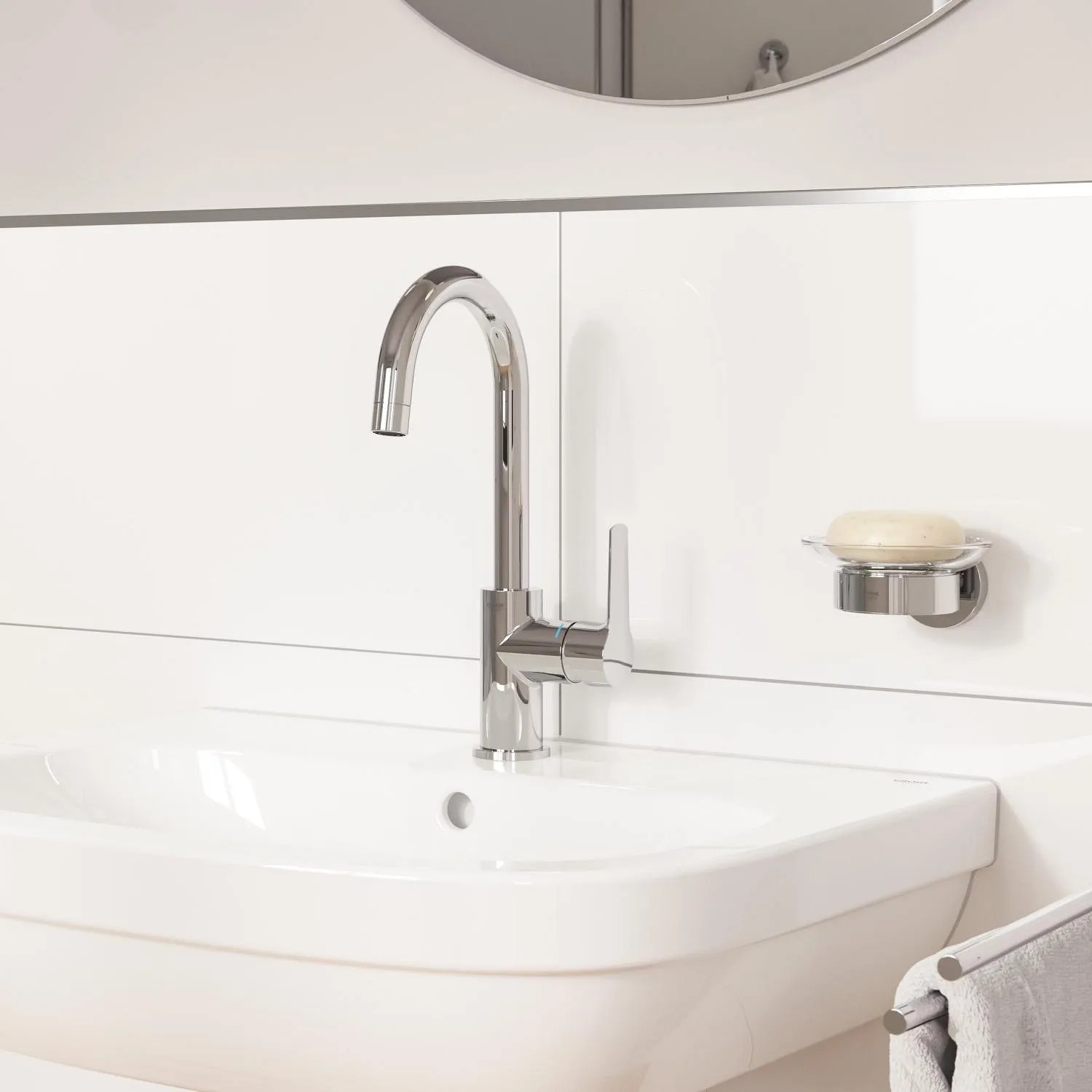 Grohe QuickFix Waschtischarmatur Start L-Size mit Zugstangen-Ablaufgarnitur auf einem weißen Waschbecken.
