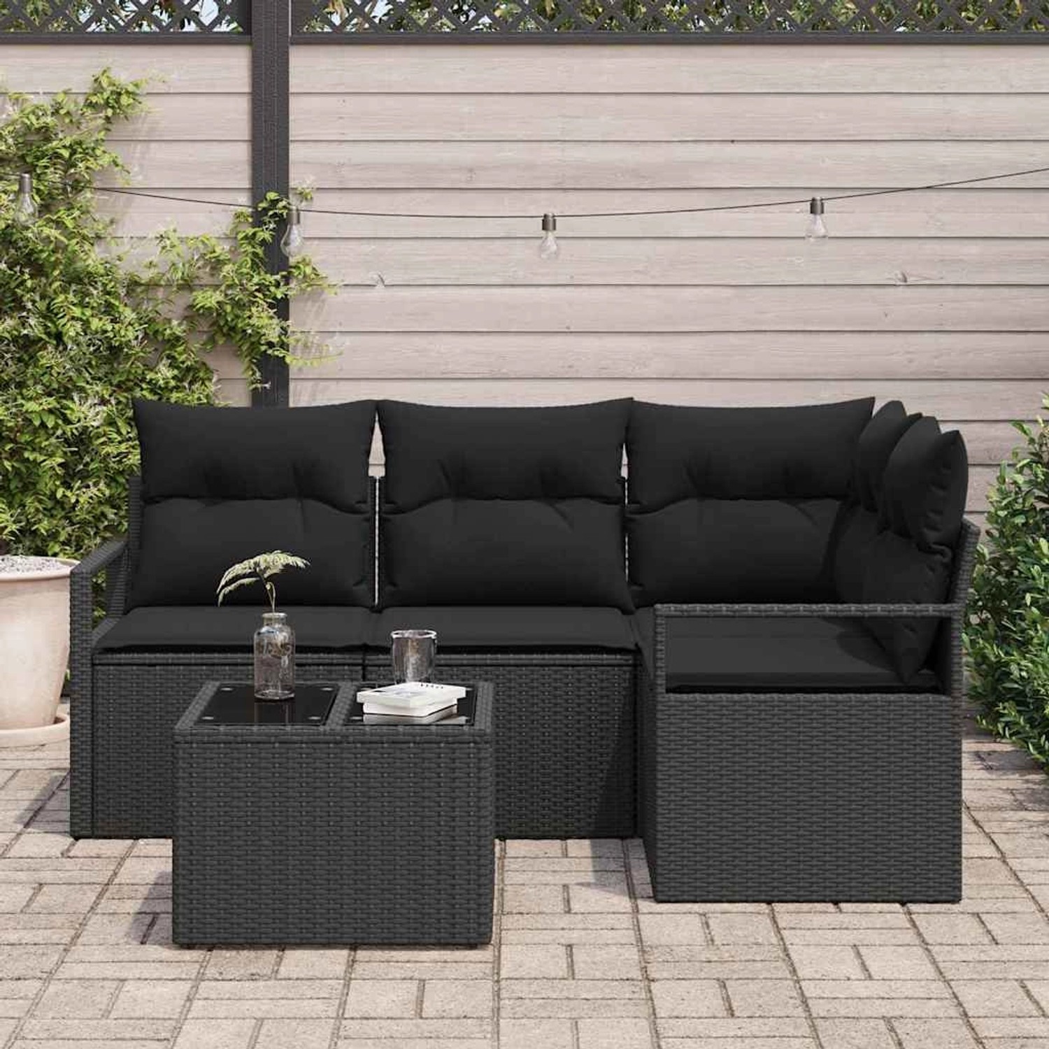 Schwarzes 5-teiliges Garten-Sofa-Set aus Poly Rattan von vidaXL mit Tisch und Polstern.