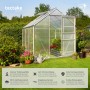 Tectake Gewächshaus mit silbernem Aluminiumrahmen, transparenten Hohlkammerplatten, offener Tür und Dachfenster im grünen Garten.