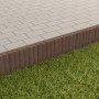 Braune Rundpalisaden 2er-Element aus Beton als Beeteinfassung.