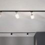 Paulmann URail Schienensystem mit LED Spots in Schwarz matt und weißem Glas.