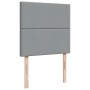 Hellgraues Boxspringbett Kopfteil 90x200 cm aus Stoff.