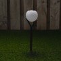 Weiße Solarleuchte Kaapstad mit Erdspieß im Garten. Dekorative Wegeleuchte mit Sensor.